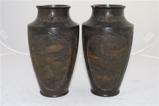 A pair of Japanese bronzed antimony alloy vases, late 19th century, 24cm